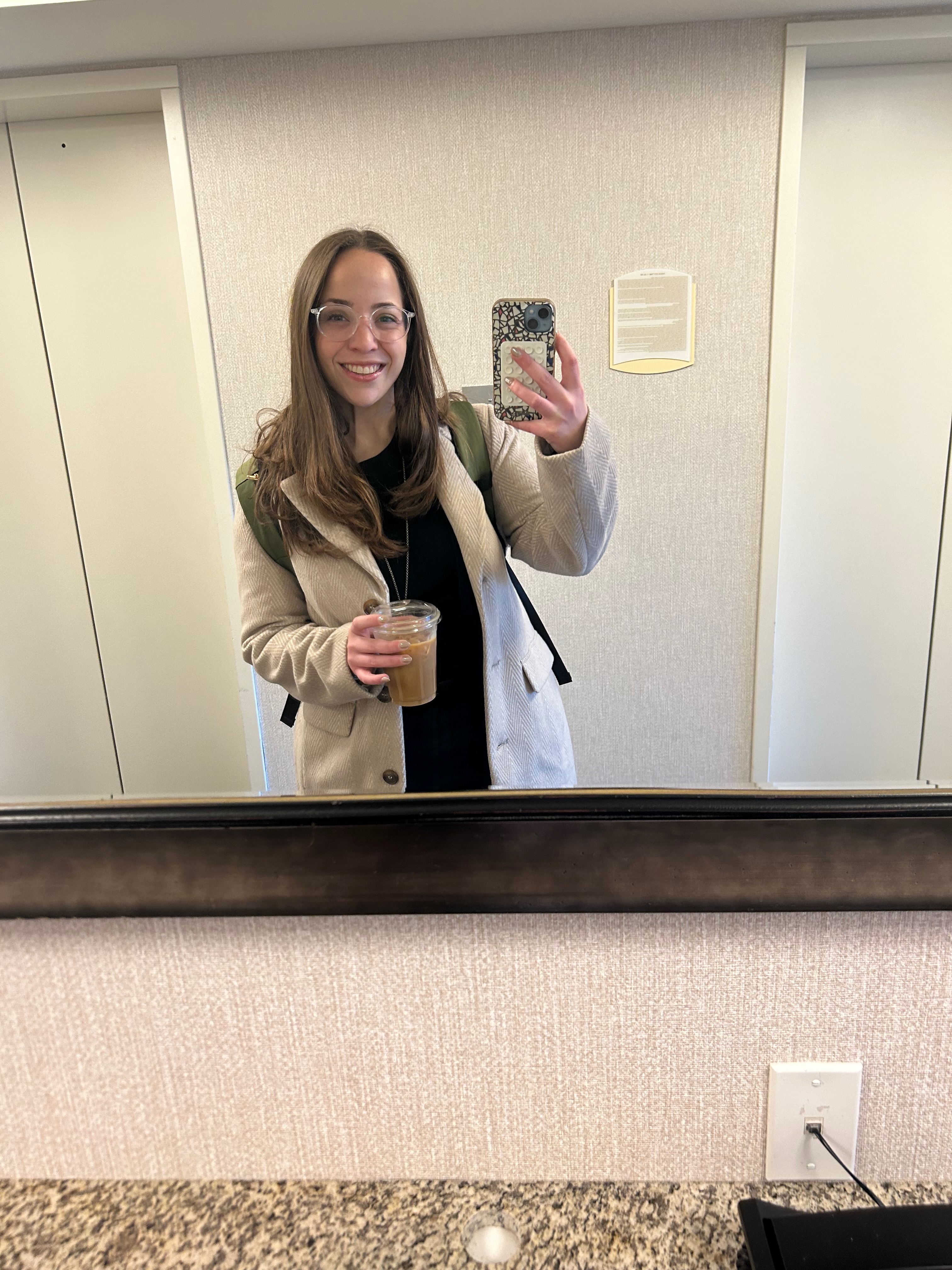 Emma professionally dressed for work travel